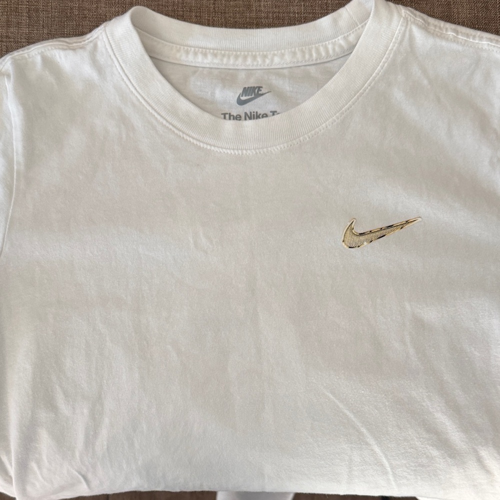 Nike White Tee with Gold Swoosh
